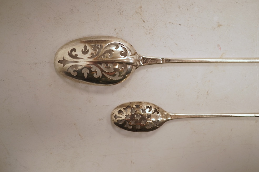 Two 18th century silver mote spoons, the largest with makers marl ?L below a crown, 13.1cm.